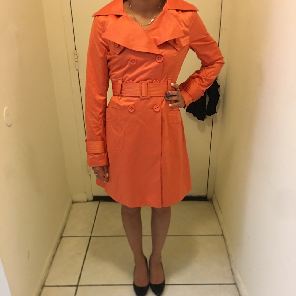 Belted orange trench jacket